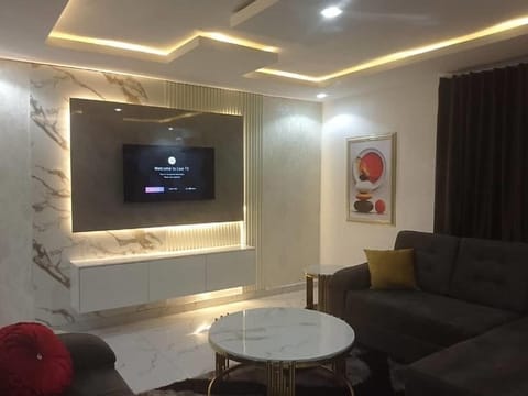 Apartment, Balcony, Garden View | Living area | TV