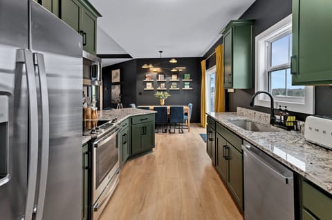 Open kitchen-to-dining flow, perfect for hosting, conversation, and shared experiences