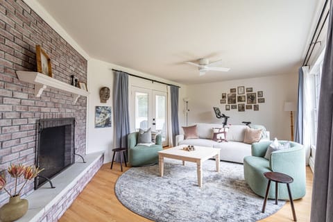 Inviting living room with fireplace. Unfortunately, the fireplace is not usable at the moment.