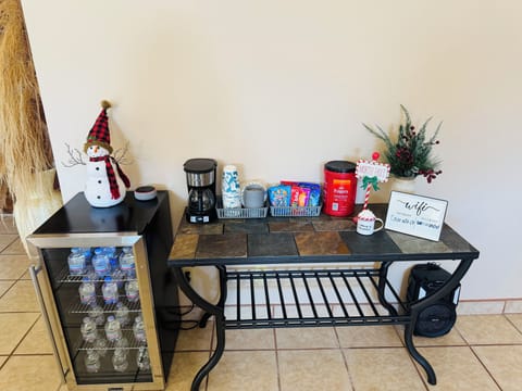 Coffee table w/ complimentary snacks and water.