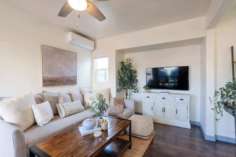 Cozy up in our inviting living room, complete with plush seating and warm decor
