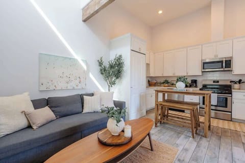 Gather and unwind in our inviting living room, designed with comfort and style in mind
