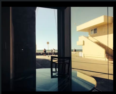 Wonderful sit down ocean, beach, and boardwalk views from inside the condo.