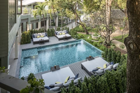 Outdoor pool, open 7:00 AM to 8:00 PM, sun loungers
