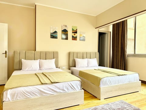 Apartment, 3 Bedrooms, Balcony | Minibar, desk, laptop workspace, soundproofing