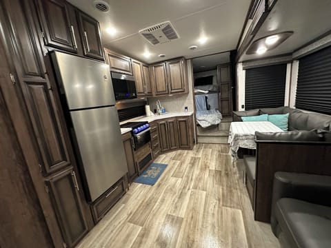 Kitchen Dining Table (Queen bunks in back)