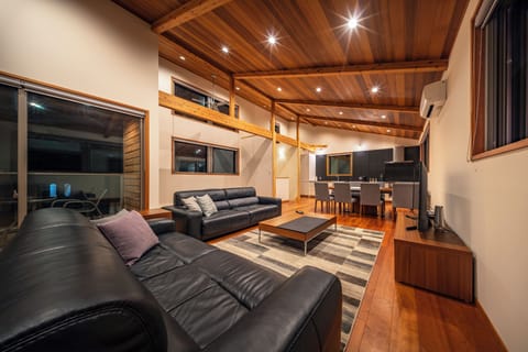 Luxury Chalet | Living area | 55-inch flat-screen TV with digital channels, TV, iPod dock