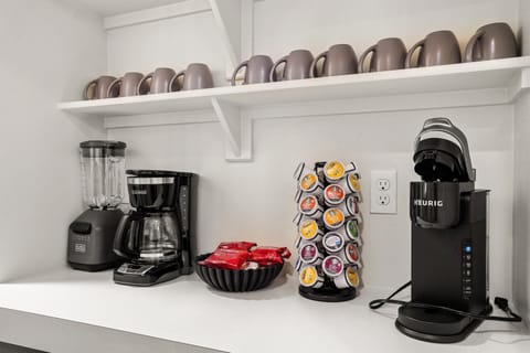 Wake up to a perfect brew with our fully stocked coffee station.
