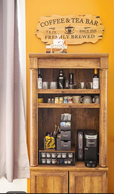 Coffee & tea bar with essentials, including wine openers, complementary liquor