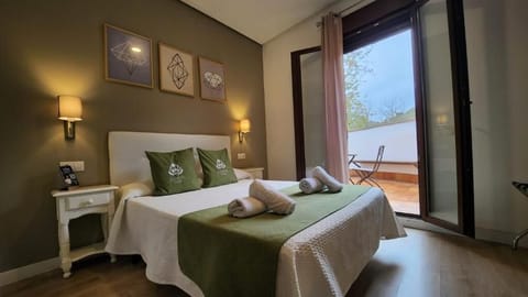 Standard Double Room, Balcony, Garden View | In-room safe, soundproofing, free WiFi
