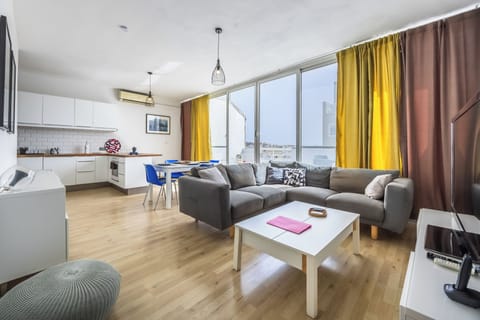 Penthouse, 2 Bedrooms, City View | Living area | TV