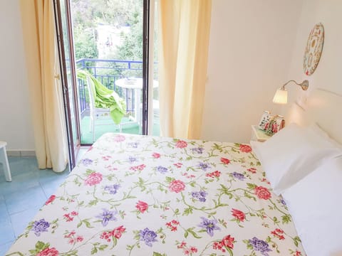 Double Room, Balcony, Partial Sea View | Minibar, in-room safe, free WiFi, bed sheets