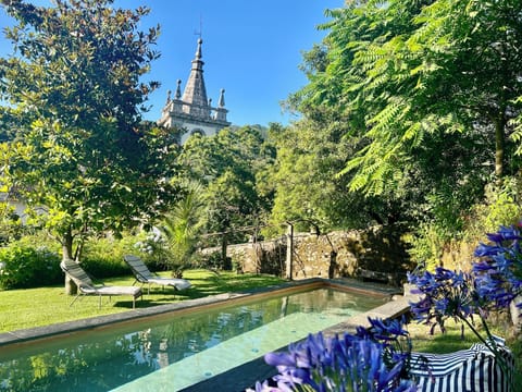 Outdoor pool, pool umbrellas, sun loungers