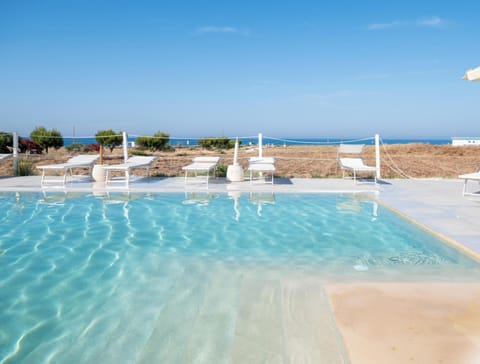 Seasonal outdoor pool, pool umbrellas, sun loungers