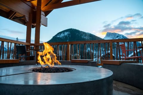 Gather around the fire pit with panoramic views for memorable mountain evenings.