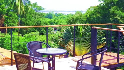 Enjoy your breakfast while watching the sunrise over Chalong Bay