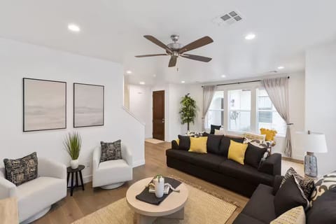 Gather the crew for movie night in this spacious living area, complete with a large flat-screen TV and comfy seating.