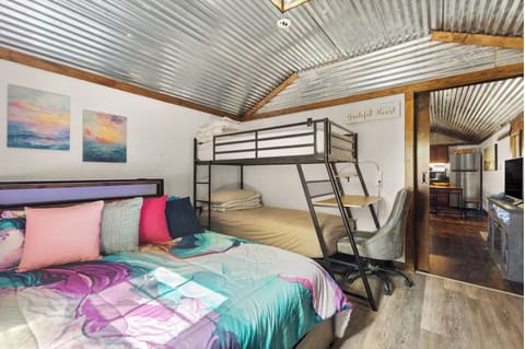Bedroom with queen bed and Bunk bed