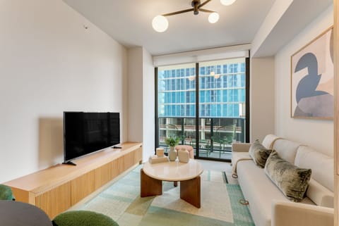 Wake up to skyline views from your cozy living room