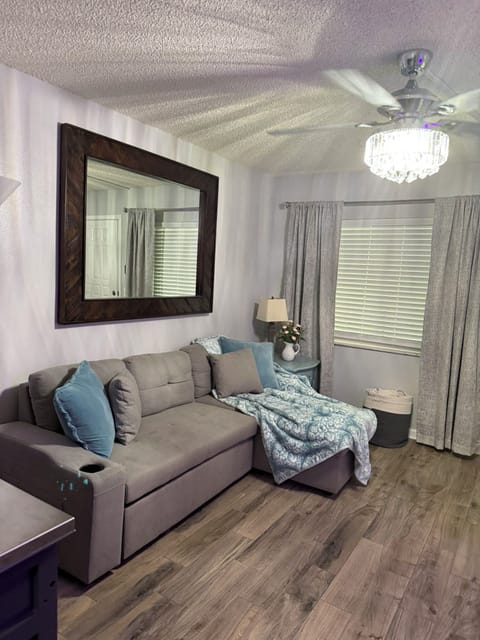 The living room is peaceful and relaxing.  The sofa makes into a double bed. 
