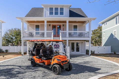 The Golf Cart is ready. Hop in & let's drive the short distance to the Beach Accesses!