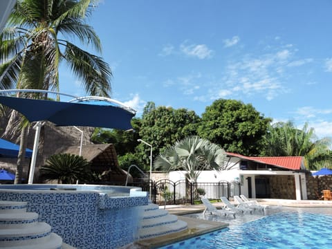 Outdoor pool, open 8 AM to 9:00 PM, sun loungers