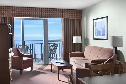 Lounge on the sofa as ocean light fills the room.