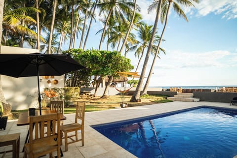 Outdoor pool, open 7:00 AM to 10:00 PM, sun loungers