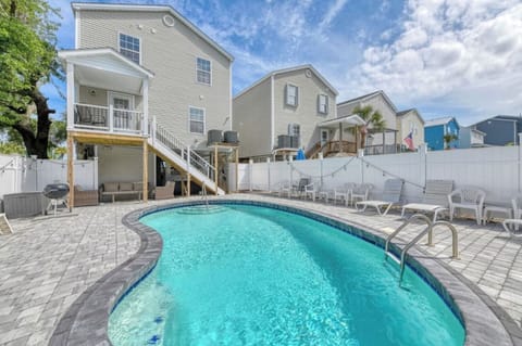 Private pool with loungers and sunny beach vibe