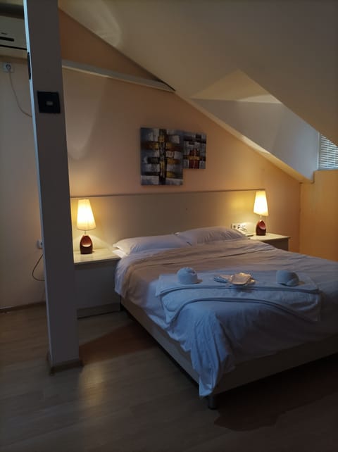 Standard Triple Room, City View | Desk, laptop workspace, free WiFi