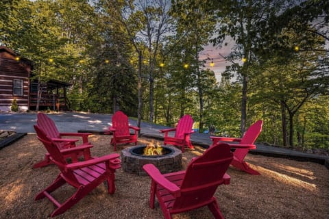 Gather around the glowing firepit under twinkling string lights as the sun sets through the trees. This is where memories are made—s`mores, stories, and starlit laughter.
