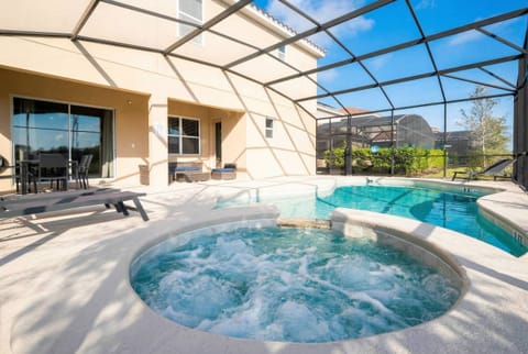Experience serenity in our private spa, nestled in a spacious screened enclosure. Relax in calming waters as sunlight brightens the cozy seating area, creating the perfect atmosphere for delightful, leisurely afternoons.