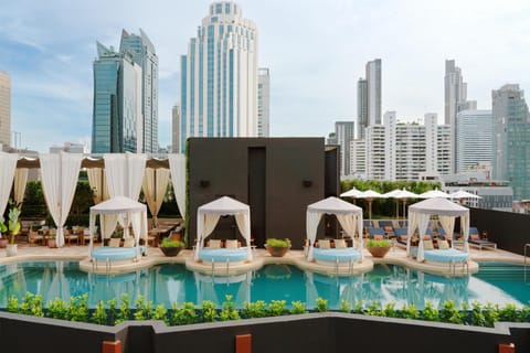 Outdoor pool, open 7:00 AM to 8:00 PM, free cabanas, sun loungers