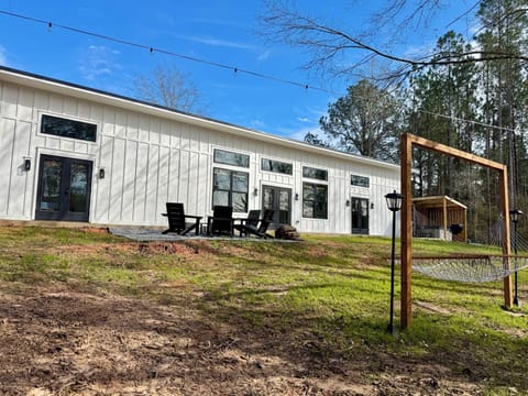 Unwind outdoors with seating, lights, and a hammock