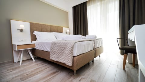 Egyptian cotton sheets, memory foam beds, in-room safe, desk