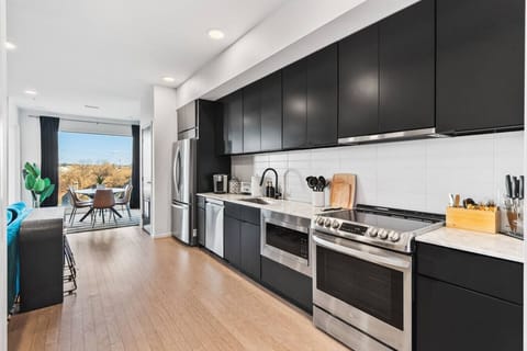 Fully equipped, modern-appliance kitchen for all of your cooking needs! Keurig machine + K-cups provided. Seating for 2 at the high-top table, and seating for 6 at the dining table.