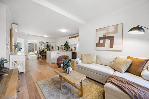 Enjoy the seamless flow between living, dining, and kitchen, creating a connected space for gathering and conversation.