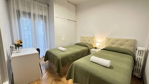 Twin Room, Shared Bathroom | Iron/ironing board, free WiFi