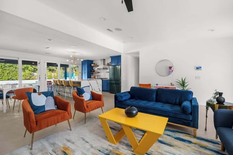 Open living space with cozy couches and smart TV