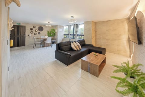Basic Apartment | Living area | 52-inch flat-screen TV with digital channels