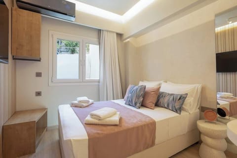 Sunlit Living & Sleeping Area with Double Bed – Bright space designed for comfort and relaxation.