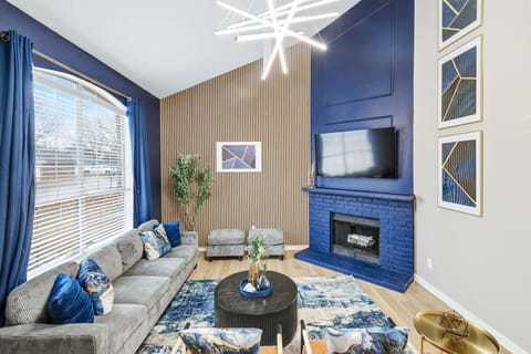 With this living room’s stylish decor and inviting atmosphere, this space is the perfect place to unwind and relax with your companions!