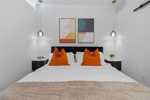 Premium Comfort: Plush bedding and a velvet headboard.