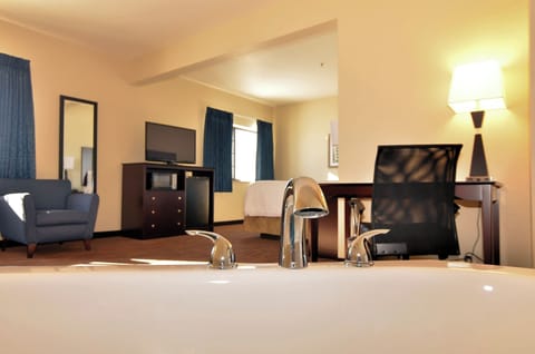 Suite, 1 King Bed, Jacuzzi Tub, Non Smoking | Premium bedding, desk, laptop workspace, iron/ironing board