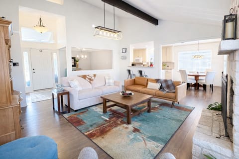 Family room with high vaulted ceiling and open concept