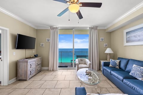 Spacious living room with stunning turquoise Gulf views and coastal elegance