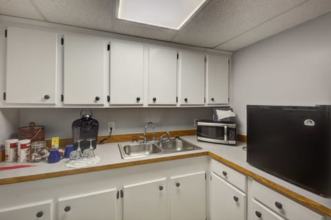 Lucy's Cave | Private kitchenette | Microwave, coffee/tea maker, highchair