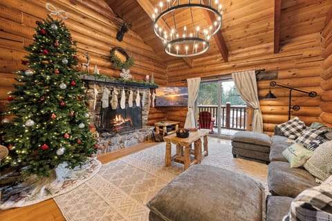 Large cozy living  anchored by a stunning rock fireplace. Board games, Xbox, TV