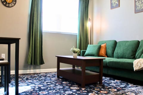 Living Area:This cozy, multi-functional space is perfect for relaxing after a day of exploring or catching up on remote work in style.