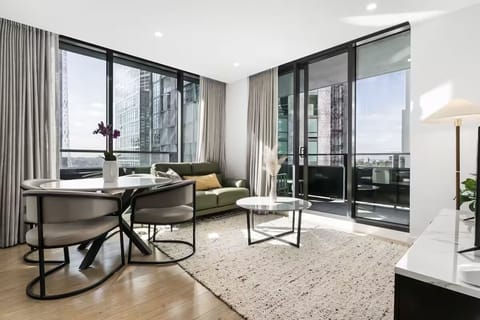 Sun-filled living area with comfortable seating and an open-plan layout.